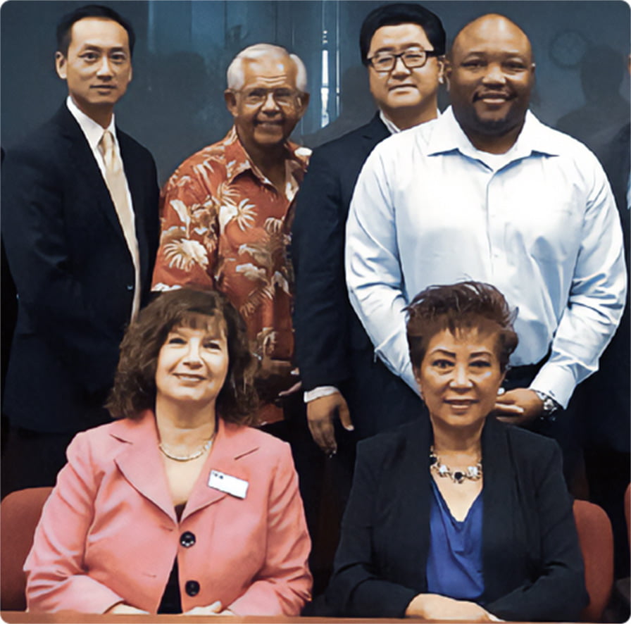 A group of OCTA team members smiling at the camera